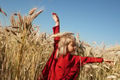 Little Happy Girl in Red Dress on a Sunny Field of Rye Little Happy Girl in Red Dress on a Sunny Field of Rye - PhotoDune Item for Sale