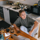 Remote work, Gen Z woman using in cozy kitchen workspace, home office Remote work, Gen Z woman using in cozy kitchen workspace, home office - PhotoDune Item for Sale