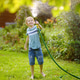 Funny preteen boy pouring cool water on himself and playing with garden hose with sprinkler Funny preteen boy pouring cool water on himself and playing with garden hose with sprinkler - PhotoDune Item for Sale