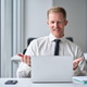 Busy happy young businessman having virtual meeting on laptop working in office. Busy happy young businessman having virtual meeting on laptop working in office. - PhotoDune Item for Sale