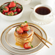 Stack of Golden Pancakes with Strawberry and Coffee on White Table Stack of Golden Pancakes with Strawberry and Coffee on White Table - PhotoDune Item for Sale