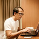 Casual adult male working with laptop in room Casual adult male working with laptop in room - PhotoDune Item for Sale