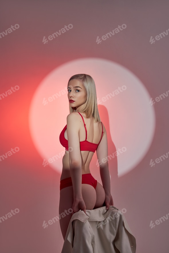 Young fashion woman in red lingerie underwear swimsuit light and shadow Stock Photo by IvaFoto Young fashion woman in red lingerie underwear swimsuit light and shadow Stock Photo by IvaFoto
