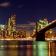 Night of Brooklyn Bridge, New York City skyline with lights shining brightly over water Night of Brooklyn Bridge, New York City skyline with lights shining brightly over water - PhotoDune Item for Sale