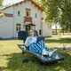 A blonde woman with a laptop works in the garden on a sun lounger, a green home office concept A blonde woman with a laptop works in the garden on a sun lounger, a green home office concept - PhotoDune Item for Sale