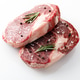 Top view of two fresh ribeye steaks with seasoning Top view of two fresh ribeye steaks with seasoning - PhotoDune Item for Sale
