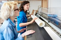 Women Changing Paper in Printing Press Women Changing Paper in Printing Press - PhotoDune Item for Sale