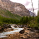 Stream Flows Through the Mountains at Marble Canyon in Kootenay National Park Canada Stream Flows Through the Mountains at Marble Canyon in Kootenay National Park Canada - PhotoDune Item for Sale