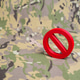 A prohibition sign on a military background. Rules and prohibitions in the army. A prohibition sign on a military background. Rules and prohibitions in the army. - PhotoDune Item for Sale