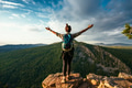 The girl travels to beautiful places. Sunset in the mountains The girl travels to beautiful places. Sunset in the mountains - PhotoDune Item for Sale
