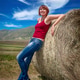 Young woman relaxing against a hay bale in the Sibillini Mountains. Young woman relaxing against a hay bale in the Sibillini Mountains. - PhotoDune Item for Sale