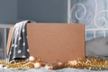 Christmas donation. Opened cardboard box mock up in bedroom with Christmas decoration Christmas donation. Opened cardboard box mock up in bedroom with Christmas decoration - PhotoDune Item for Sale