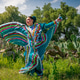 Traditional Mexican folkloric dancer with turquoise dress and cactus landscape Traditional Mexican folkloric dancer with turquoise dress and cactus landscape - PhotoDune Item for Sale
