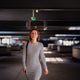 Confident Woman Walking Through Parking Garage Confident Woman Walking Through Parking Garage - PhotoDune Item for Sale