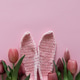Easter Knitted Bunny Ears with Pink Tulips on Pink Background. Spring Holiday Flat Lay Easter Knitted Bunny Ears with Pink Tulips on Pink Background. Spring Holiday Flat Lay - PhotoDune Item for Sale