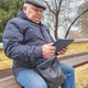 Senior man with tablet on park bench digital literacy Senior man with tablet on park bench digital literacy - PhotoDune Item for Sale