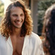 Smiling young man with long curly hair enjoying summer moment outdoors Smiling young man with long curly hair enjoying summer moment outdoors - PhotoDune Item for Sale