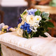 Wedding bouquet over the grooms bench Wedding bouquet over the grooms bench - PhotoDune Item for Sale