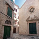 Narrow street in the old town of Trogir, Croatia Narrow street in the old town of Trogir, Croatia - PhotoDune Item for Sale