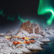 Breathtaking winter view on Hamnoy village at night with Northern lights (Aurora Borealis). Breathtaking winter view on Hamnoy village at night with Northern lights (Aurora Borealis). - PhotoDune Item for Sale