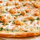 Close up of hot fresh pizza with chicken and greenery Close up of hot fresh pizza with chicken and greenery - PhotoDune Item for Sale