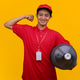 Cheerful Delivery Man in Red Uniform Carrying Large Water Gallon Cheerful Delivery Man in Red Uniform Carrying Large Water Gallon - PhotoDune Item for Sale