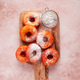 Place the baked donuts on a cutting board, sprinkled with powdered sugar, home cooking, no people, Place the baked donuts on a cutting board, sprinkled with powdered sugar, home cooking, no people, - PhotoDune Item for Sale
