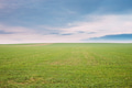 Countryside Rural Field Meadow Landscape In Spring Cloudy Day. Scenic Agricultural Landscape Countryside Rural Field Meadow Landscape In Spring Cloudy Day. Scenic Agricultural Landscape - PhotoDune Item for Sale