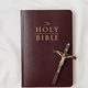 A symbolic Christian composition with Holy Bible land a cross A symbolic Christian composition with Holy Bible land a cross - PhotoDune Item for Sale