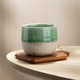 Japanese Style Ceramic Tea Cup on Wooden Coaster with Soft Natural Light Japanese Style Ceramic Tea Cup on Wooden Coaster with Soft Natural Light - PhotoDune Item for Sale