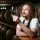 Winemaker Inspecting Red Wine in Cellar Winemaker Inspecting Red Wine in Cellar - PhotoDune Item for Sale
