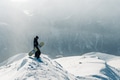 man stay and watch with snowboard equipment man stay and watch with snowboard equipment - PhotoDune Item for Sale