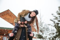 Couple having fun and laughing in winter Couple having fun and laughing in winter - PhotoDune Item for Sale