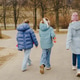 Girls walk with skateboards in city park. Teens wear jackets, jeans, sneakers. Teenagers enjoy Girls walk with skateboards in city park. Teens wear jackets, jeans, sneakers. Teenagers enjoy - PhotoDune Item for Sale