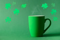 Irish coffee in green cup and special cupcakes for St Patrick s Day. Irish coffee in green cup and special cupcakes for St Patrick s Day. - PhotoDune Item for Sale