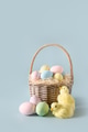 Easter wicker basket with pastel eggs for Happy holiday and celebration . Easter wicker basket with pastel eggs for Happy holiday and celebration . - PhotoDune Item for Sale