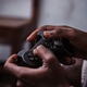 Holding a gaming pad Holding a gaming pad - PhotoDune Item for Sale