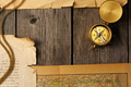 Antique compass over old map Antique compass over old map - PhotoDune Item for Sale