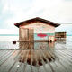 Simple Wooden Shack on a Wet Coastal Jetty Simple Wooden Shack on a Wet Coastal Jetty - PhotoDune Item for Sale