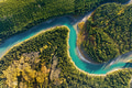 A drone view of the river in the woods. An aerial view of an autumn forest. Alberta, Canada. A drone view of the river in the woods. An aerial view of an autumn forest. Alberta, Canada. - PhotoDune Item for Sale