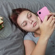 Young Woman Lying on Bed Using Smartphone And Eating Sandwich at Home Young Woman Lying on Bed Using Smartphone And Eating Sandwich at Home - PhotoDune Item for Sale