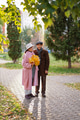 Happy European elderly couple who have lived together for 50 years walk in the park on a warm autumn Happy European elderly couple who have lived together for 50 years walk in the park on a warm autumn - PhotoDune Item for Sale