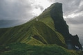 Lighthouse on cliffs in Faroe Islands Lighthouse on cliffs in Faroe Islands - PhotoDune Item for Sale