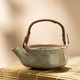 Japanese Ceramic Teapot on Bamboo Mat with Copy Space Japanese Ceramic Teapot on Bamboo Mat with Copy Space - PhotoDune Item for Sale