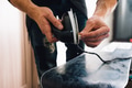 man is waxing a snowboard man is waxing a snowboard - PhotoDune Item for Sale