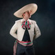 A man wearing a sombrero and a white shirt A man wearing a sombrero and a white shirt - PhotoDune Item for Sale