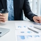 Business woman use calculator to calculate investment figures Business woman use calculator to calculate investment figures - PhotoDune Item for Sale