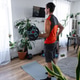 Man runs in place at home, sporty top, fitness mat, airy bright room, Man runs in place at home, sporty top, fitness mat, airy bright room, - PhotoDune Item for Sale