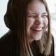 Cute girl smiling and listening music Cute girl smiling and listening music - PhotoDune Item for Sale