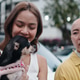 Thai friends enjoying outdoor moment with pet dog, connecting and discussing Thai friends enjoying outdoor moment with pet dog, connecting and discussing - PhotoDune Item for Sale